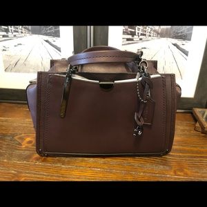 Coach dreamer. Oxblood. Medium size.